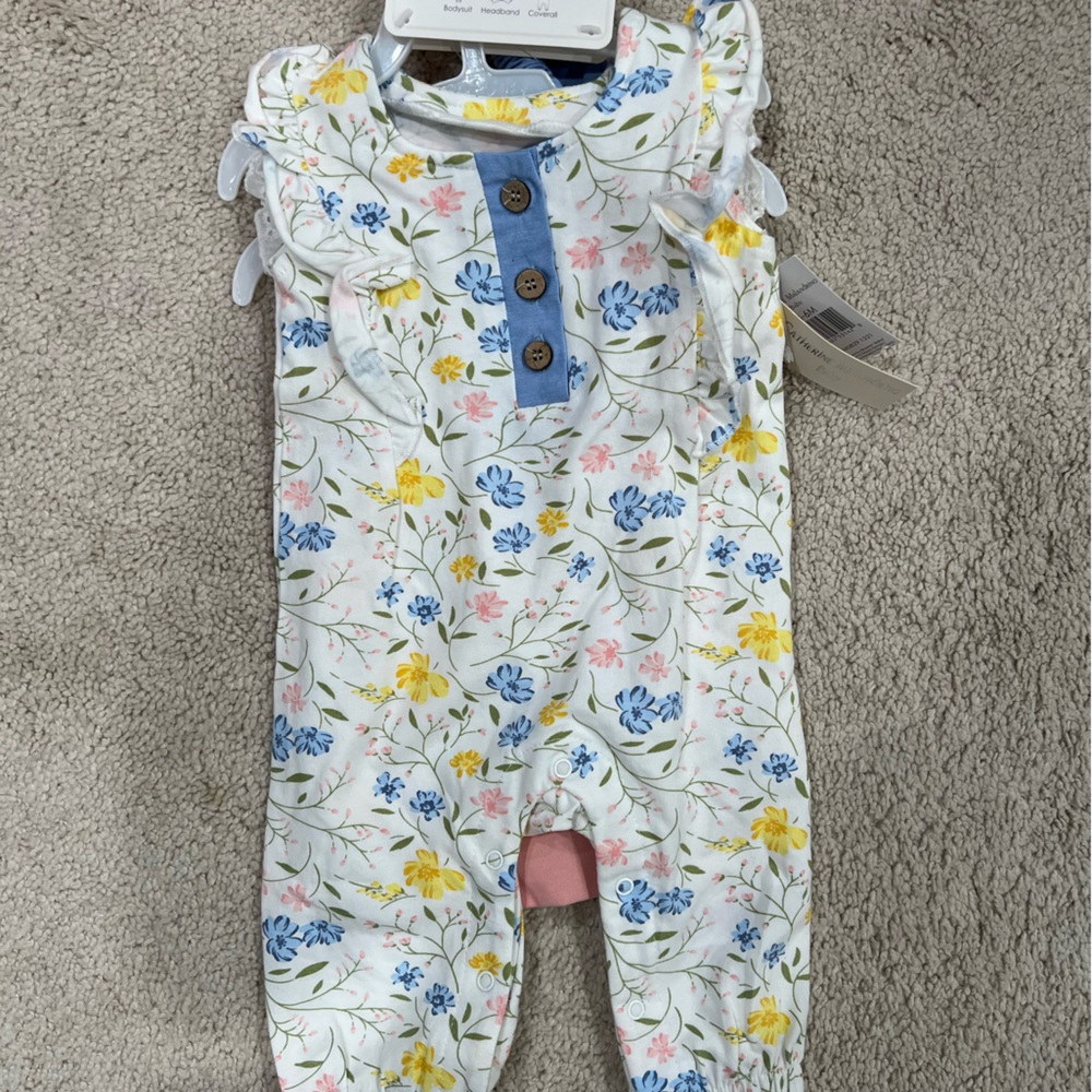 Catherine:  Three piece set- jumpsuit, short sleeve onesie and matching bow.